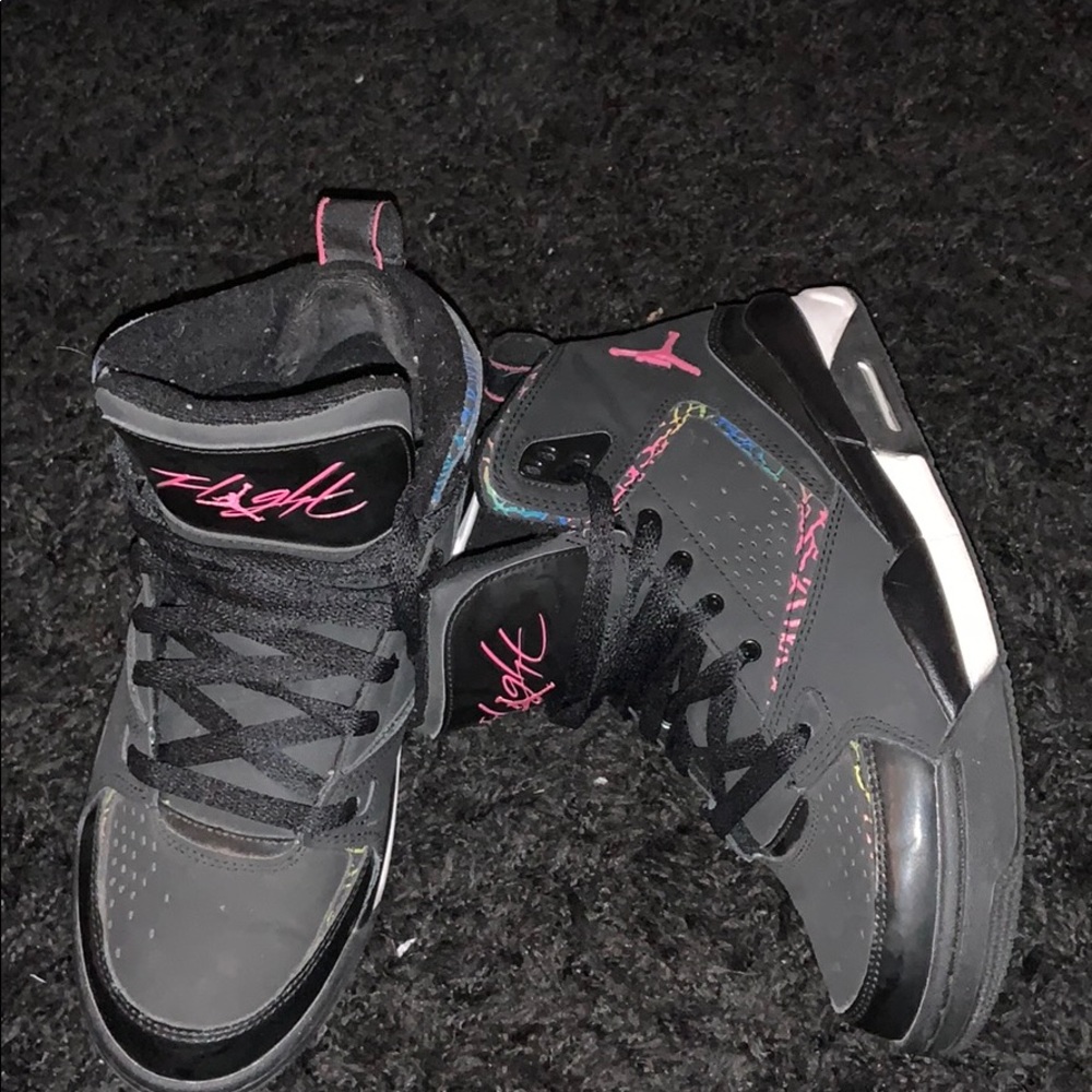 Black and Rainbow Jordans.